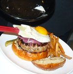 Duck egg slides atop pork burger.JPG